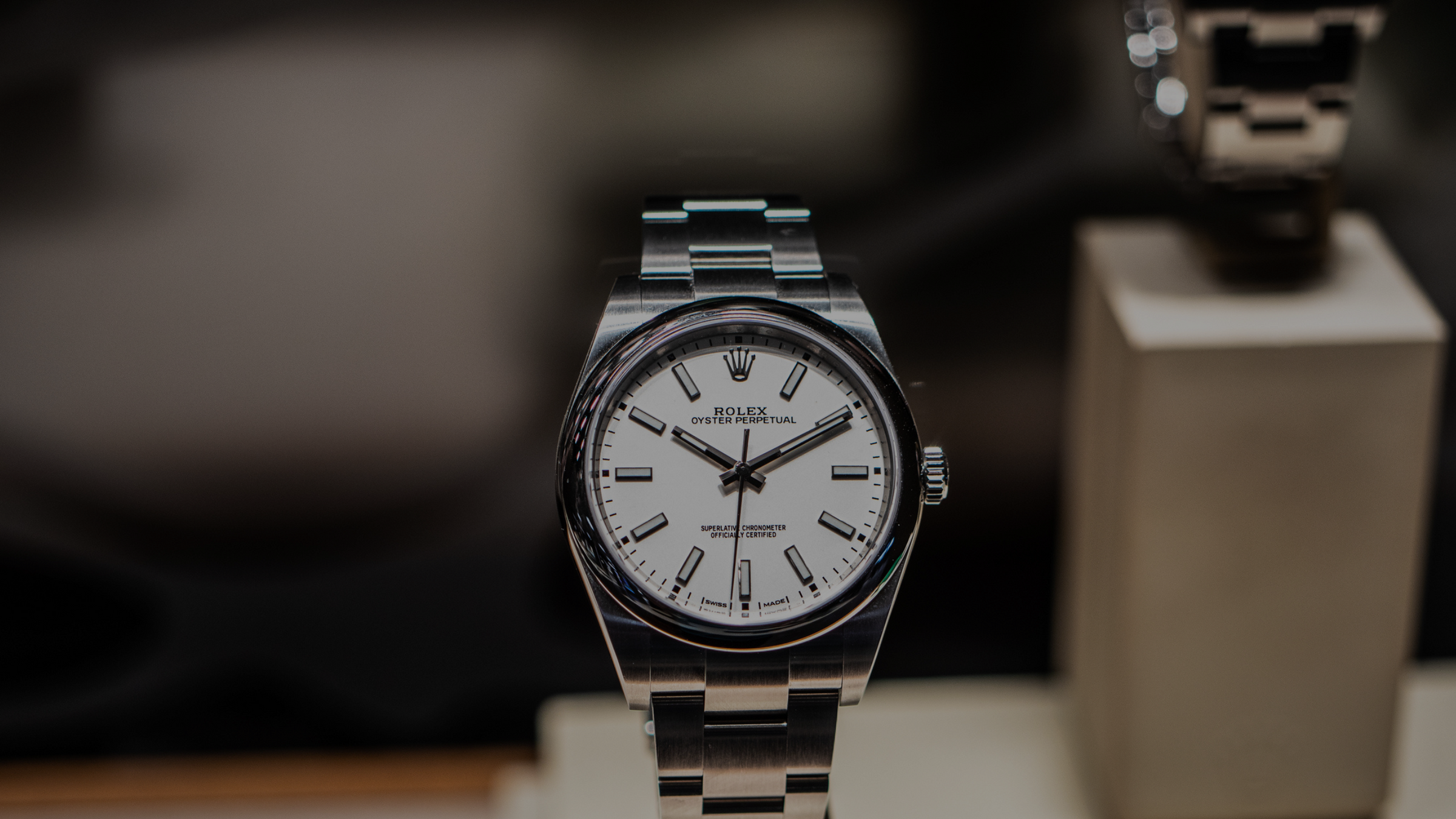 centered rolex silver watch
