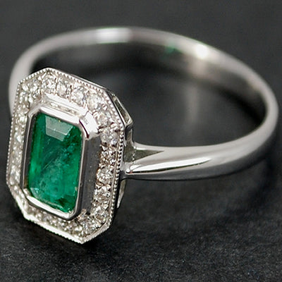 18ct White Gold Emerald and Diamond Halo Cluster Ring