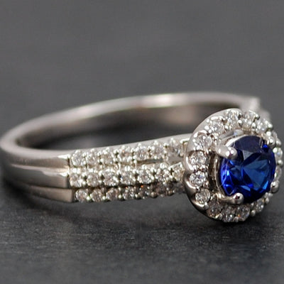 18ct White Gold Sapphire and Diamond Halo Cluster Ring