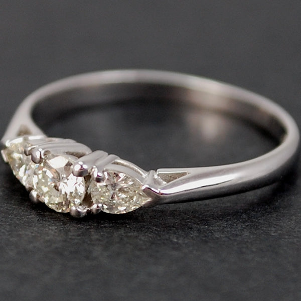 18ct White Gold Brilliant Cut and Pear Shape 3 Stone Diamond Ring