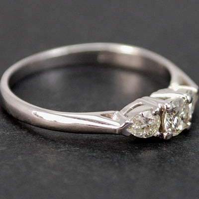 18ct White Gold Brilliant Cut and Pear Shape 3 Stone Diamond Ring