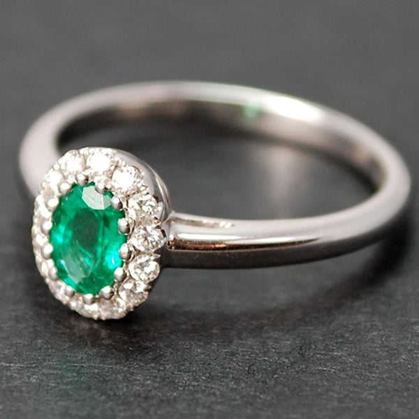 18ct White Gold Emerald and Diamond Oval Cluster Ring