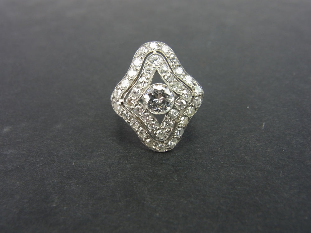 Art Deco Diamond Cluster ring set in Platinum