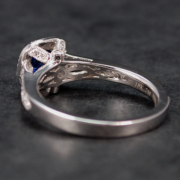 18ct White Gold Sapphire and Diamond Halo Ring