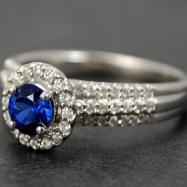 18ct White Gold Sapphire and Diamond Halo Cluster Ring